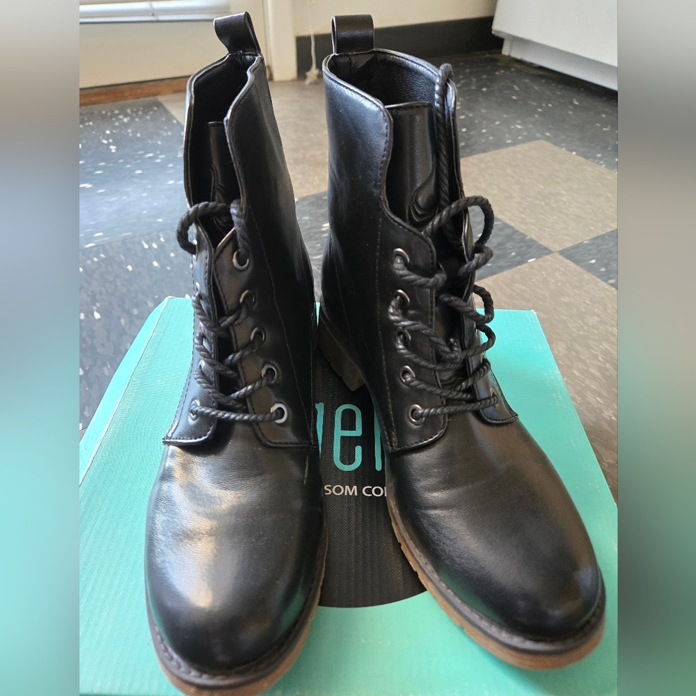 De Blossom Collection Black Lace Up Boots Sleek and Flexible